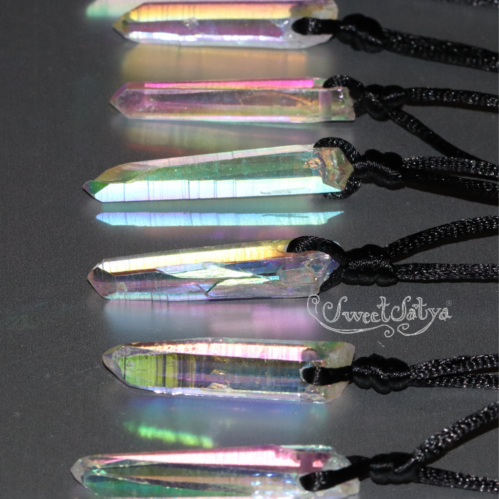Can someone help me pls :( I was thinking of buying an Angel aura quartz  necklace because I really liked this one but I don't know if this one is  real :